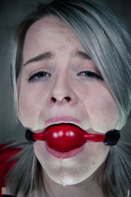 Naked chick Bambi Belle is tortured beyond belief while tied up in a dungeon