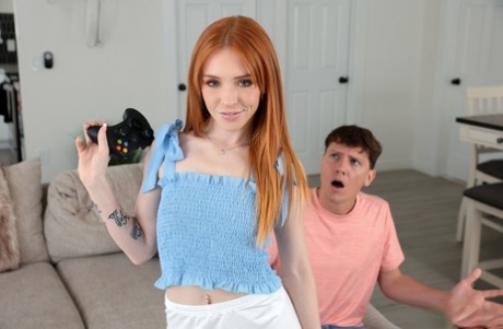 Skinny redheaded teen Madi Collins has sex with a gamer boy