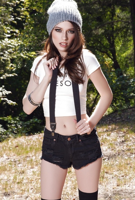 Amateur babe Caitlin McSwain poses and undresses right in the forest