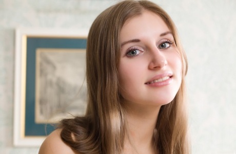 Stunning teen Viva B showing her beautiful breasts & her very yummy pussy